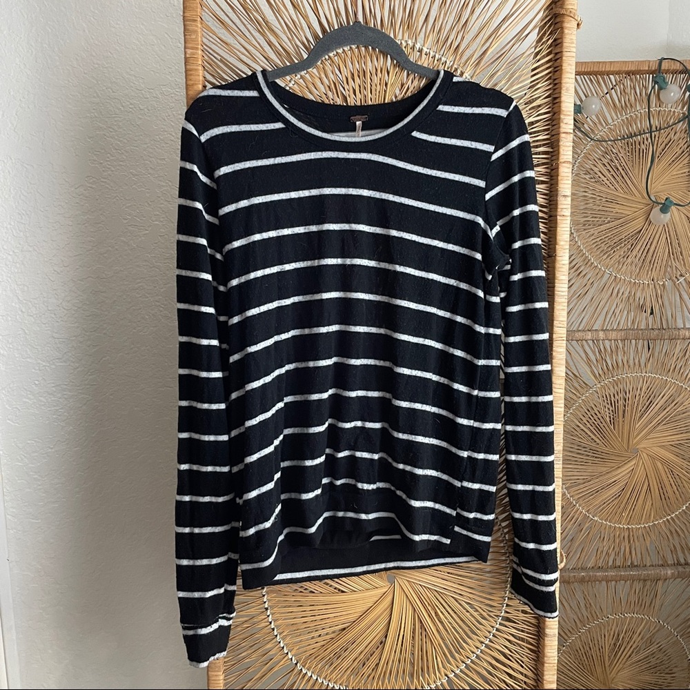 Striped black and white sweater with cutout